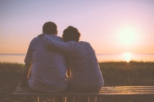 older couple watching sunset after rehab insurance verification process