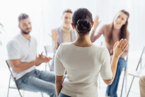 a group therapy session at an Opioid Addiction Treatment Center